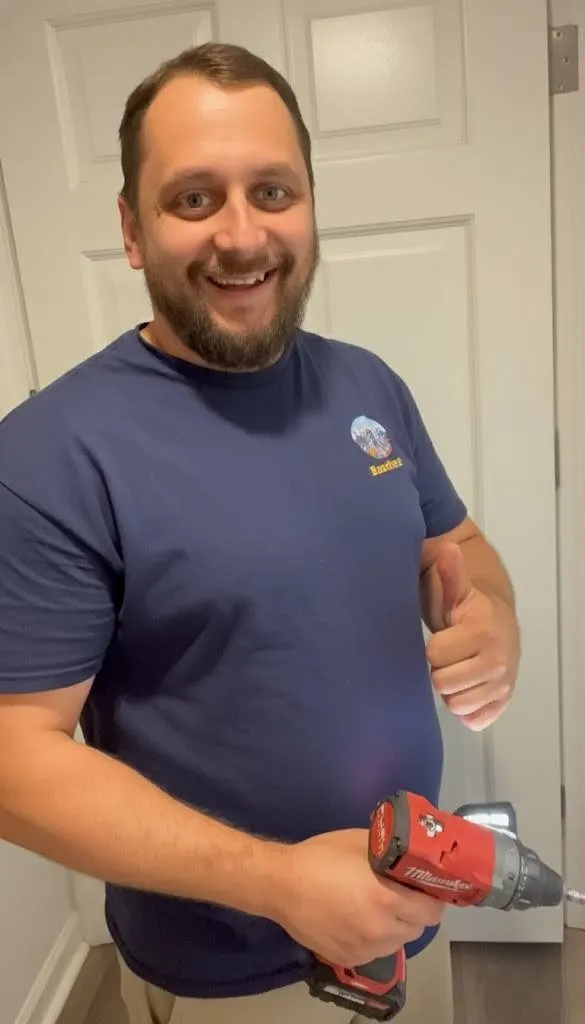 Andrei working on appliance repair